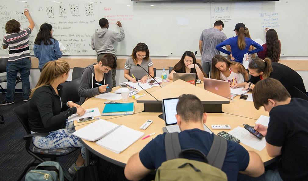 Students study in an active learning classroom